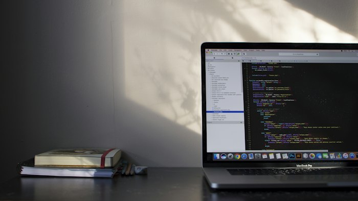 Laptop showing website code
